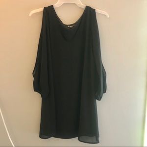 Black, flowing, long sleeve dress